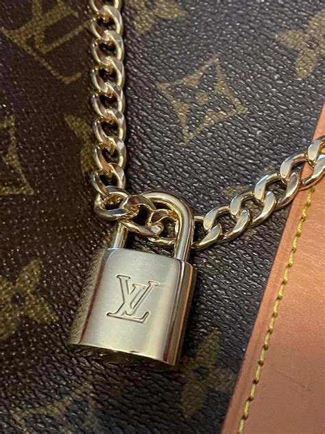 louis vuitton zipper authentic|authentic louis vuitton lock key.